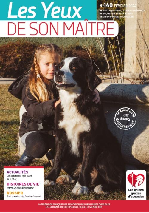 Il s'agit de la couverture de la revue &quot;Les Yeux de son Maître&quot; numéro 140. Une photo d'une petite fille qui enlace un chien guide noir et blanc.